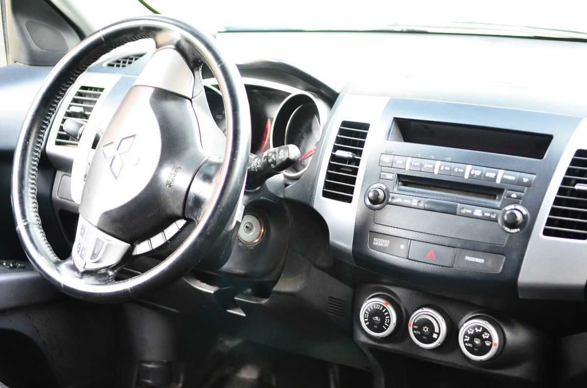 Mitsubishi outlander ii / xl (2006-2012) – на дороге и в гараже