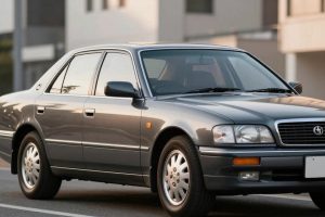 Седан Toyota Mark X первого поколения на городской улице